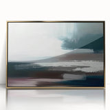 Framed wall art featuring an abstract design with gold strokes and lines, set against a sleek white background, ideal for modern home decor.