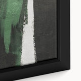 Close-up of a framed canvas print showcasing an abstract strokes and lines design in vibrant colors, perfect for modern home decor and artistic settings.