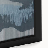 Close-up of a framed canvas artwork showcasing an abstract design with colorful strokes and lines, perfect for modern home decor, adding a vibrant touch to any interior.