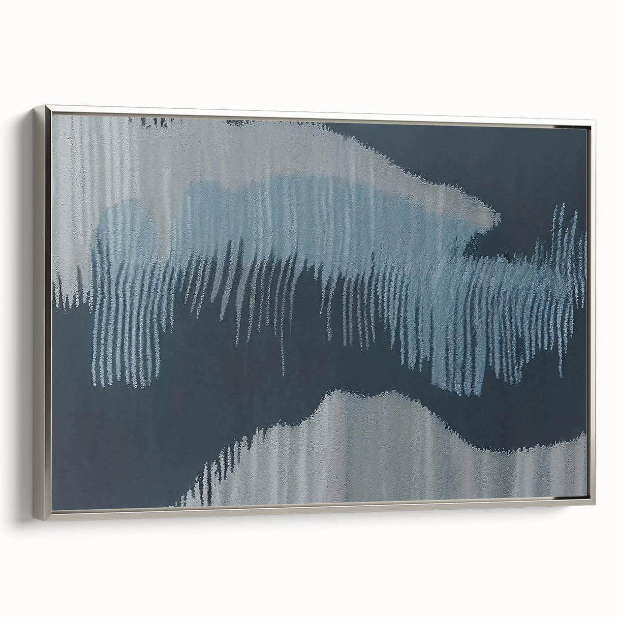 Framed canvas wall art showcasing an abstract design of colorful strokes and lines, featuring a sleek silver frame, ideal for modern home decor.