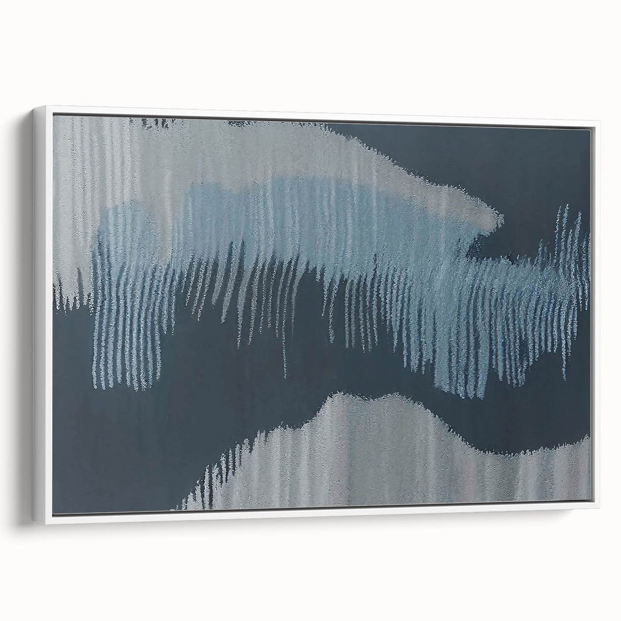 Framed canvas wall art showcasing an abstract design with colorful strokes and lines on a white background, perfect for modern home decor.