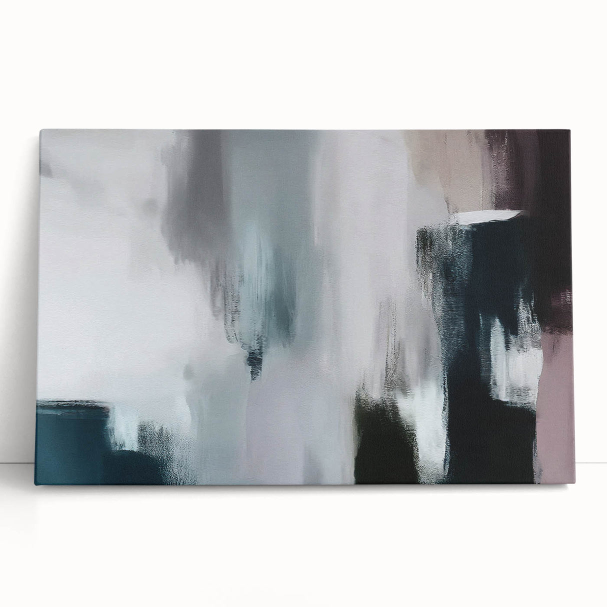 Abstract wall art featuring dynamic strokes and lines in shades of blue, gold, and white, displayed on a stretched canvas leaning against a wall. This modern design adds a vibrant touch to any contemporary home decor.
