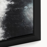 Close-up of a framed canvas art piece showcasing an abstract design with colorful strokes and lines, perfect for modern home decor or office art.