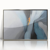 Framed wall art featuring an abstract design of colorful strokes and lines in silver and white, ideal for modern decor. The piece adds a stylish touch to any living space.