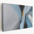 Stretched canvas wall art showcasing an abstract design of colorful strokes and lines, displayed from a side view, ideal for modern home decor.
