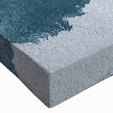 Close-up view of a vibrant abstract strokes and lines design on stretched canvas, showcasing a colorful blend of blues, greens, and yellows, ideal for modern home decor.