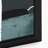 Framed canvas art showcasing an abstract design of vibrant strokes and lines in shades of blue, orange, and yellow, perfect for modern home decor.