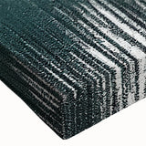 Close-up of a vibrant abstract wall art canvas showcasing dynamic strokes and lines in shades of blue, orange, and yellow, perfect for modern home decor.