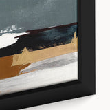 Close-up of a framed canvas print showcasing an abstract design with colorful strokes and lines, ideal for modern decor, adding vibrancy to any space.