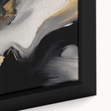 Close-up of a framed canvas artwork showcasing an abstract design with vibrant strokes and lines in shades of blue, orange, and yellow, ideal for modern decor.