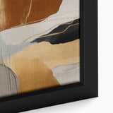Close-up of a modern abstract wall art design featuring vibrant strokes and lines in blue, orange, and gold hues, framed elegantly for stylish decor.