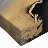 Close-up of a stretched canvas wall art featuring an abstract design of colorful strokes and lines, showcasing vibrant hues of blue, red, and yellow, perfect for modern decor.