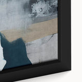 Close-up of a framed canvas showcasing an abstract design with vibrant strokes and lines in shades of blue, yellow, and orange, perfect for modern home decor. Ideal for enhancing living spaces with contemporary art.