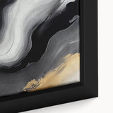 Close-up of a framed abstract wall art piece showcasing vibrant strokes and lines in shades of blue, orange, and yellow, perfect for modern home decor.