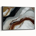 Framed canvas artwork showcasing an abstract design with bold strokes and lines in black, perfect for modern decor. Side view highlights the sleek frame and intricate details.