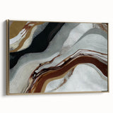 Framed canvas wall art featuring an abstract design of strokes and lines in gold and neutral tones, showcasing modern elegance for stylish home decor.