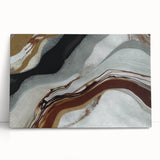 Abstract strokes and lines in vibrant colors create a modern wall art piece on stretched canvas, leaning against a neutral backdrop, perfect for contemporary decor.