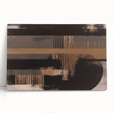 Abstract wall art featuring vibrant strokes and lines in blue, orange, and yellow hues, displayed as a stretched canvas leaning against a wall, adding a modern touch to interior decor.