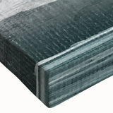 Close-up of a vibrant abstract wall art design featuring bold strokes and lines in shades of blue, yellow, and pink on stretched canvas, perfect for modern decor.