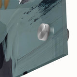 Close-up of a modern abstract wall art piece showcasing vibrant strokes and lines in shades of blue, orange, and gold, designed for acrylic glass display.