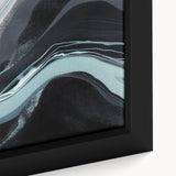 Close-up of framed abstract wall art showcasing vibrant strokes and lines in a modern design, ideal for contemporary home decor. The intricate details and bold colors enhance any living space, creating a striking visual focal point.