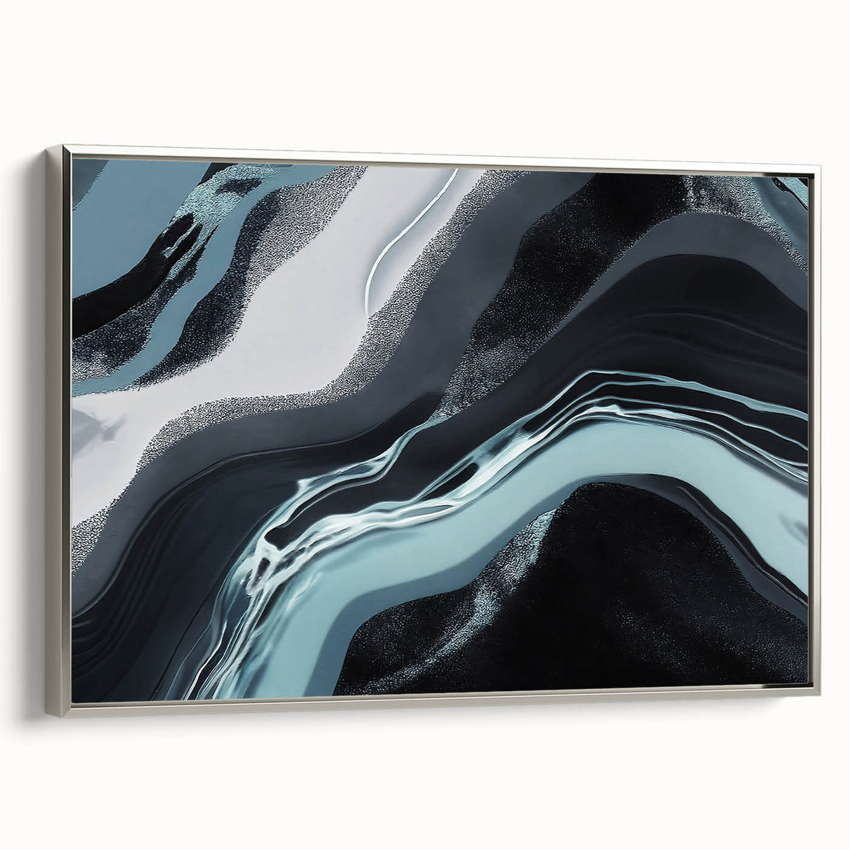 Framed canvas wall art showcasing an abstract design with vibrant strokes and lines in silver tones, perfect for modern home decor. Side view highlights its elegant framing and artistic depth.