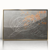 Framed acrylic wall art featuring an abstract design of bold strokes and lines in gold and black, perfect for modern home decor. Ideal for enhancing living spaces with a touch of elegance and creativity.