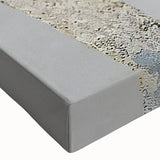 Close-up of a stretched canvas featuring an abstract design with colorful strokes and lines, ideal for modern home decor and artistic expression.