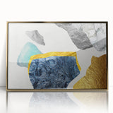 Framed wall art featuring an abstract design of vibrant strokes and lines in gold, perfect for modern decor. The artwork is set in a sleek frame, enhancing any living space with elegance.