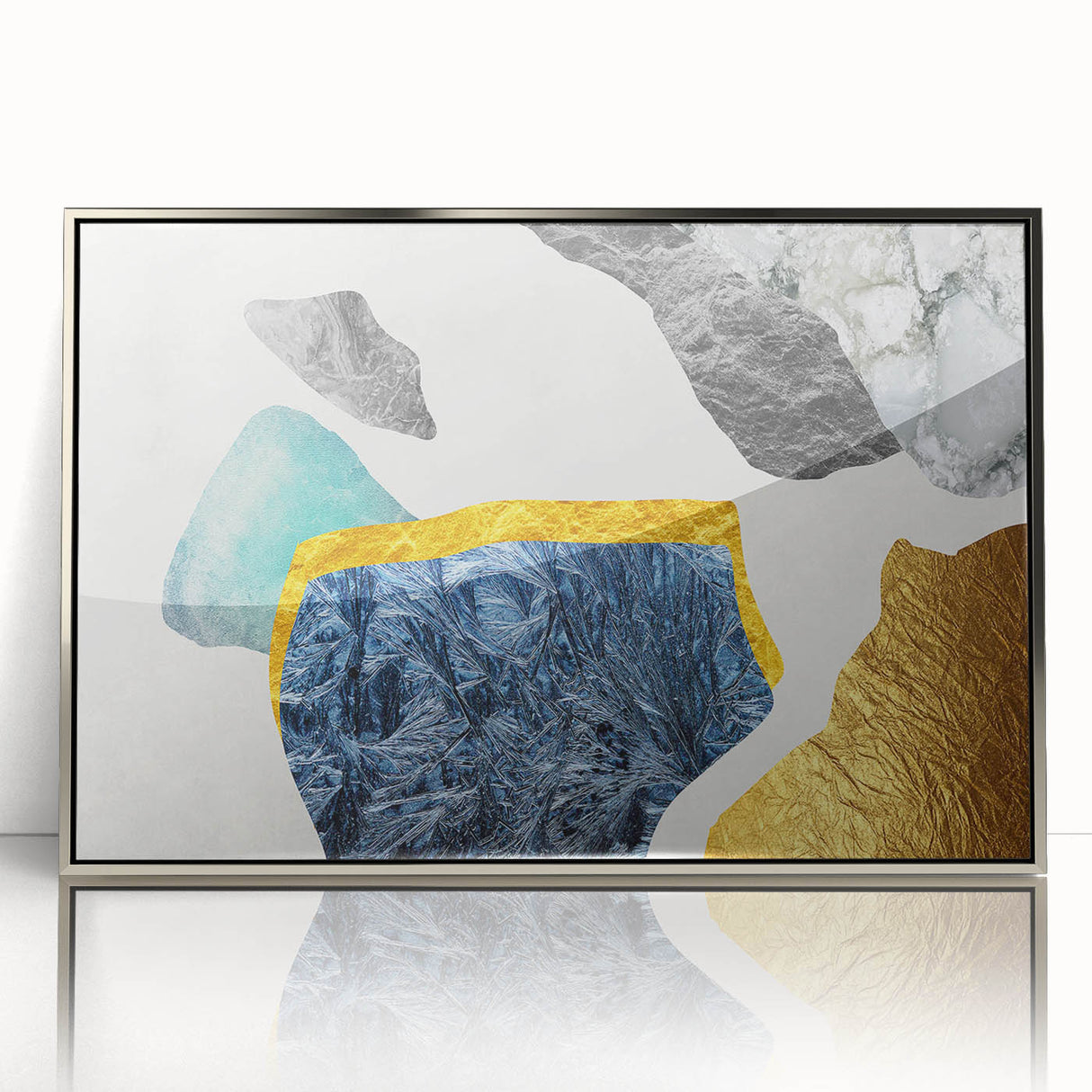 Framed wall art featuring abstract strokes and lines in silver and white, showcasing a modern design. Ideal for contemporary home decor and artistic accents.