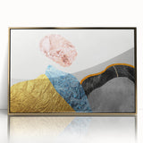 Framed abstract wall art featuring dynamic strokes and lines in gold and black, set against a white background, perfect for modern home decor.