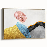 Framed canvas wall art showcasing an abstract design with bold strokes and lines in gold and neutral tones, perfect for modern home decor.
