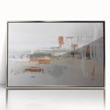 Framed wall art featuring an abstract design of strokes and lines in shades of blue, grey, and silver, adding a modern touch to any interior decor.