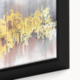 Close-up of a framed canvas wall art piece showcasing an abstract design with colorful strokes and lines, perfect for modern home decor.