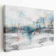 Abstract wall art featuring vibrant strokes and lines in shades of blue, orange, and gray on a stretched canvas, showcasing a modern artistic design suitable for contemporary home decor.
