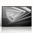 Framed acrylic print of large abstract wall art featuring geometric shapes in black and gray.
