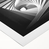 Art deco poster featuring geometric patterns in muted gold and black on a rolled canvas, suitable for dining room decor.