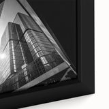 Abstract textured art on a framed canvas featuring black and colorful strokes, ideal for living room decor.