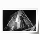 Abstract architecture print in muted gray and blue tones on rolled canvas, suitable for art wall dining room.