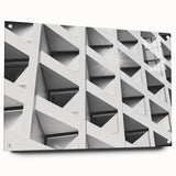 Large abstract wall art on acrylic glass featuring swirling gray and white patterns.