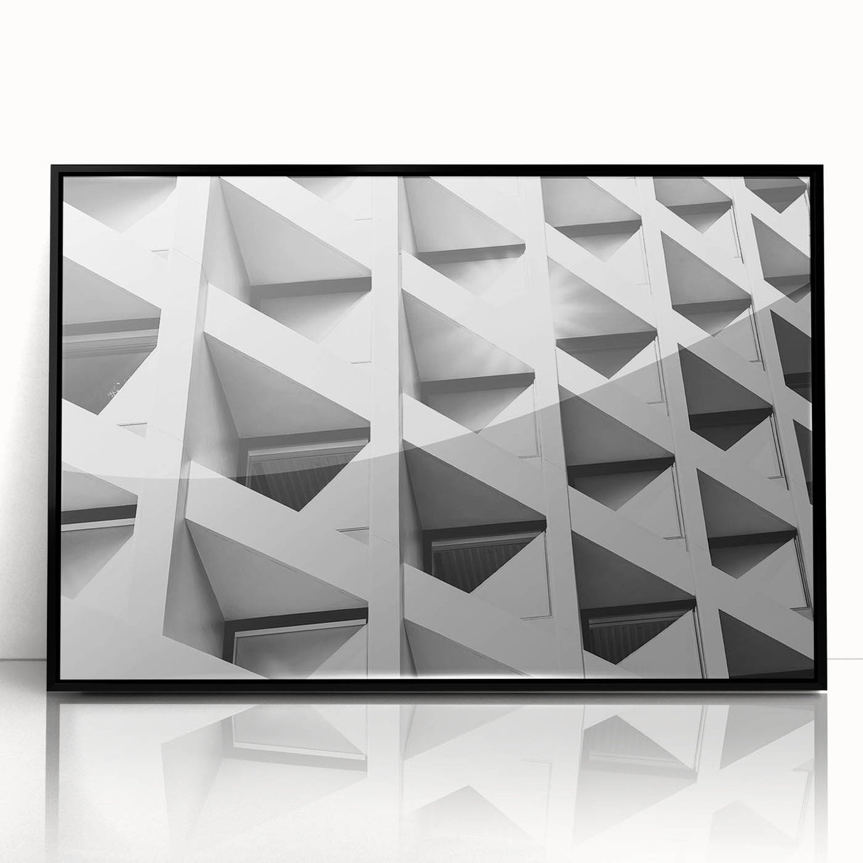 Framed acrylic print of large abstract wall art featuring geometric shapes in muted earth tones.