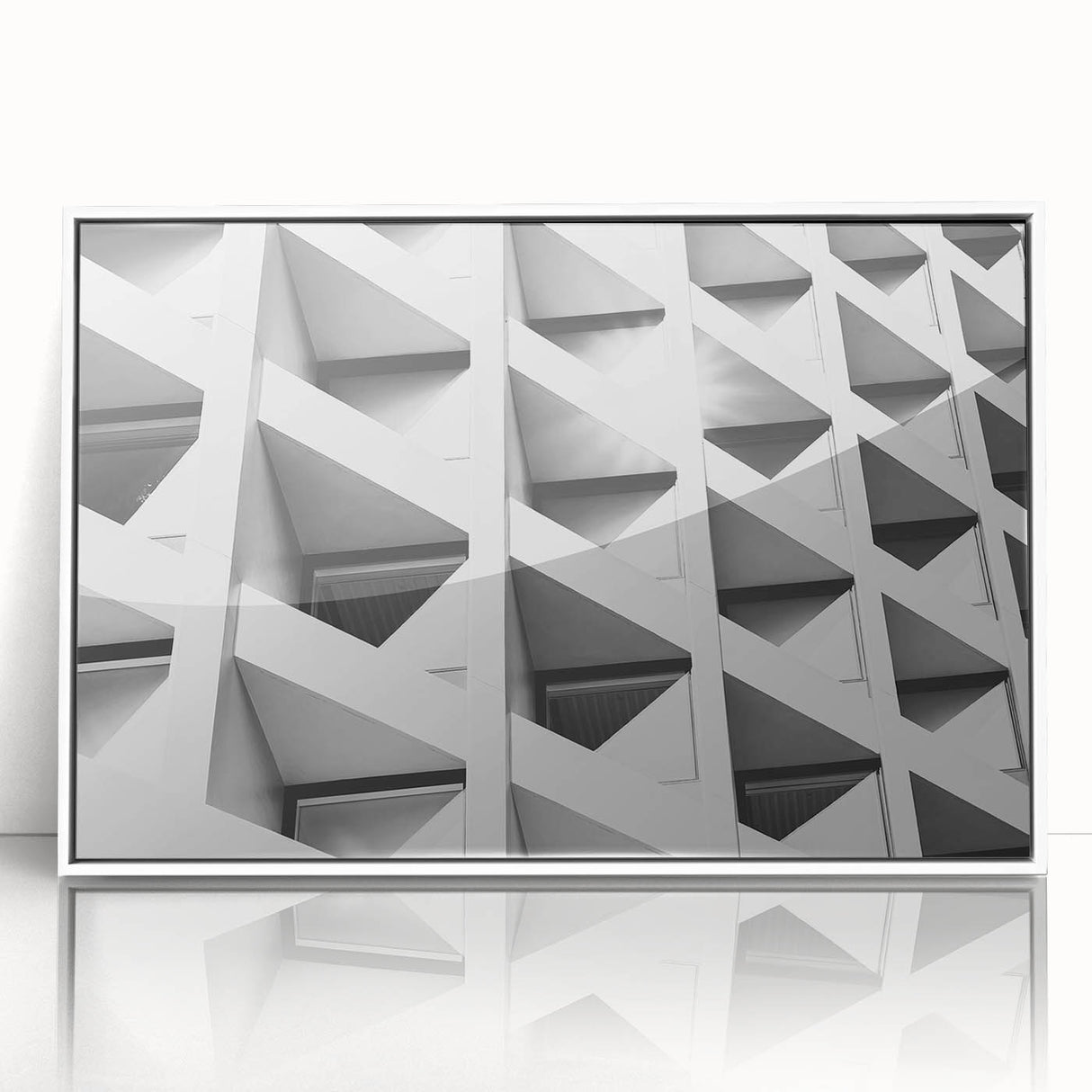 Large art print of abstract architecture in muted grays and whites on a framed acrylic, ideal for modern art wall decor.