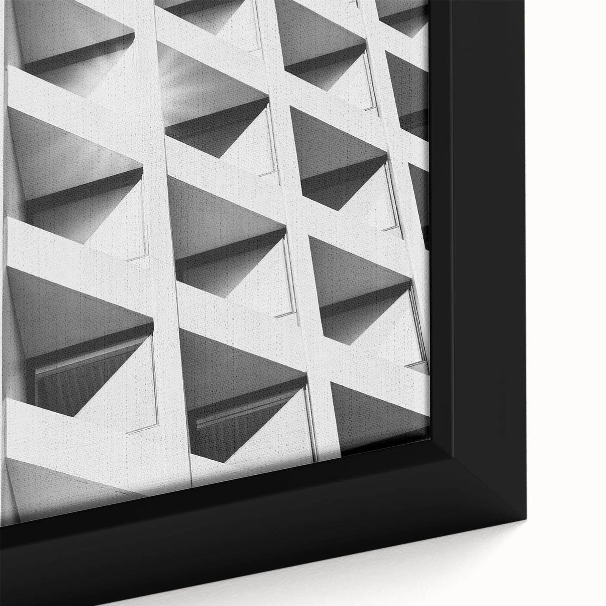 Extra large framed canvas featuring textured, abstract architecture in black with colorful accents.