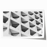 Abstract floral architecture in muted gray and blue tones on a rolled canvas, ideal for dining room wall art.