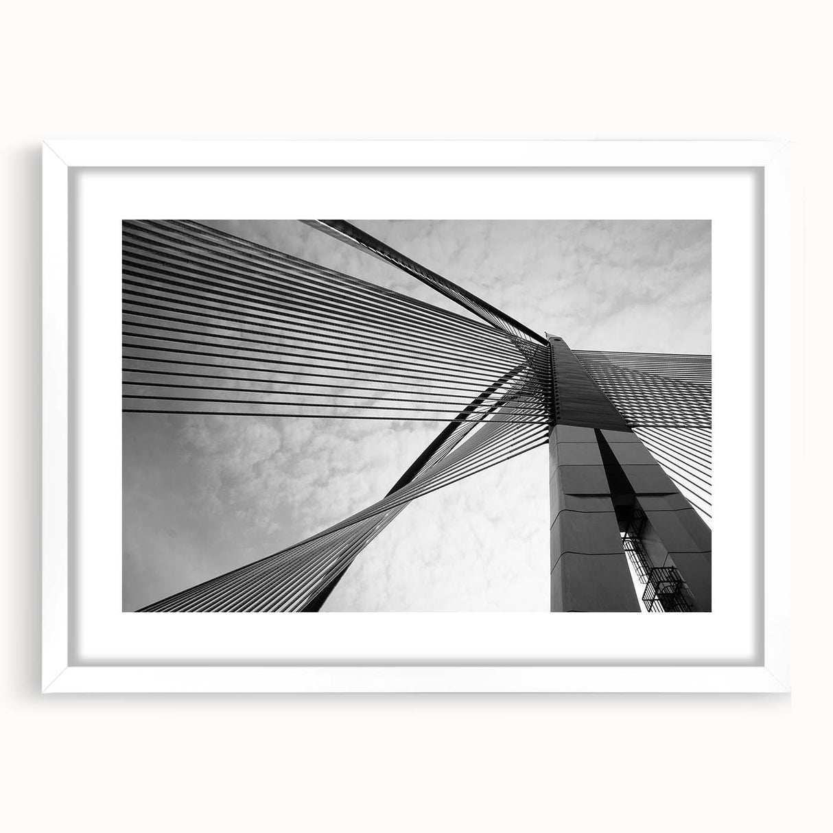 Extra large abstract art print featuring textured swirls in muted gray and blue tones, framed in white.