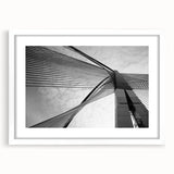 Extra large abstract art print featuring textured swirls in muted gray and blue tones, framed in white.