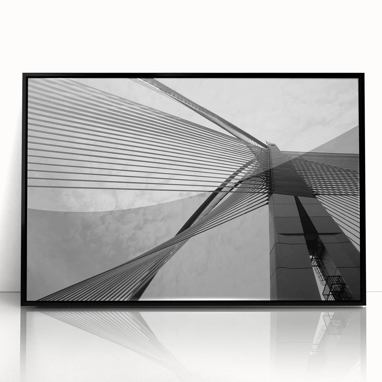 Large abstract wall art featuring geometric shapes in muted beige and gray, framed in black acrylic.