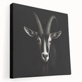 Antelope wall art design on stretched canvas showcasing a side view of a graceful antelope in a natural setting, ideal for wildlife enthusiasts and home decor.
