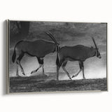 Framed wall art featuring a sleek silver-colored antelope design, showcasing intricate details and a modern aesthetic, perfect for enhancing contemporary decor.
