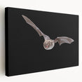 Stretched canvas wall art depicting a whimsical bat design in vibrant colors, ideal for wildlife lovers, showcasing intricate details and unique textures.